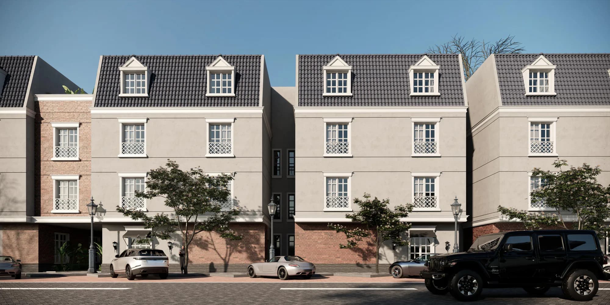 Developer render of the Al Majdiah 192 facades: pale stone elevations, framed windows and a slate mansard roof with dormers