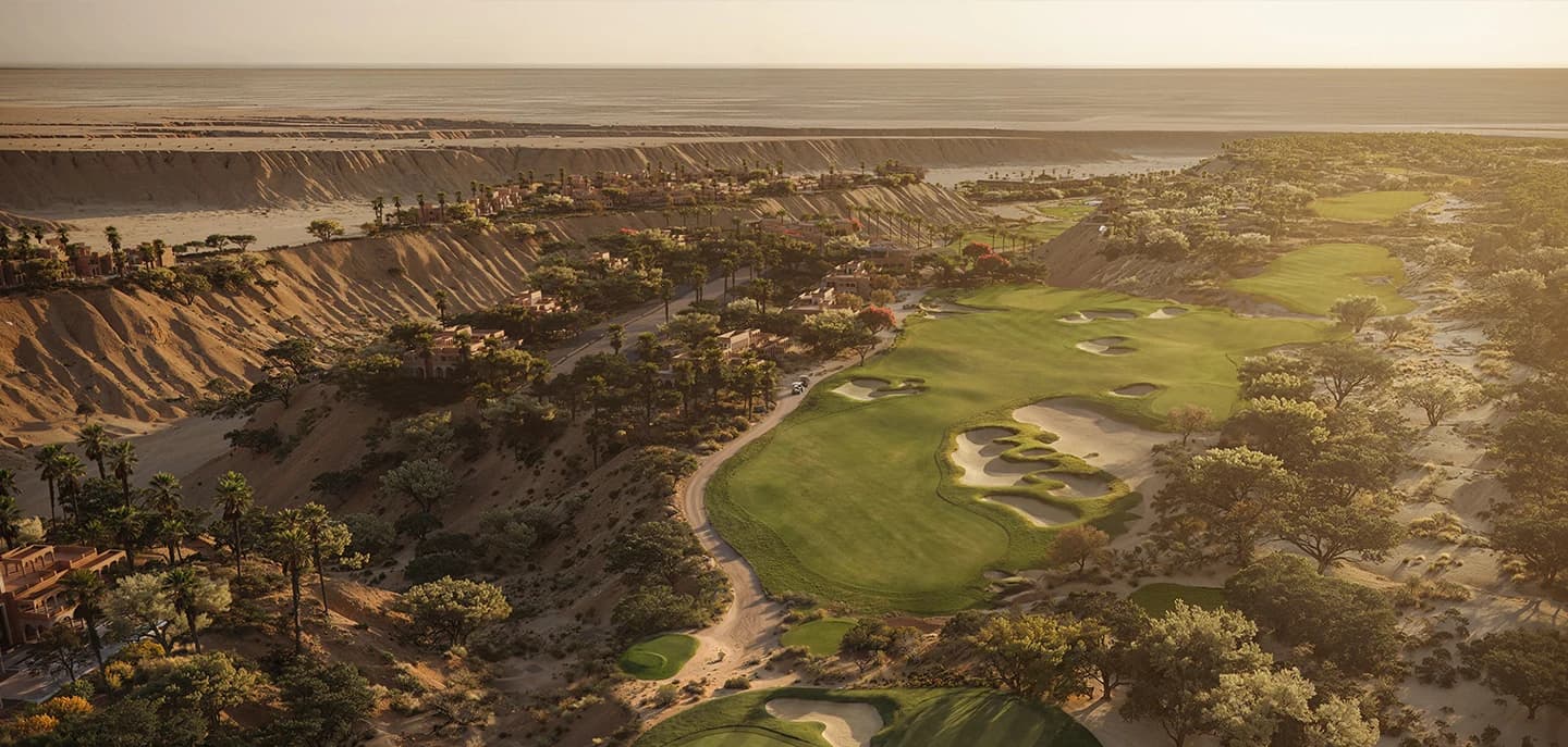 The championship golf course tracing the line of the wadi