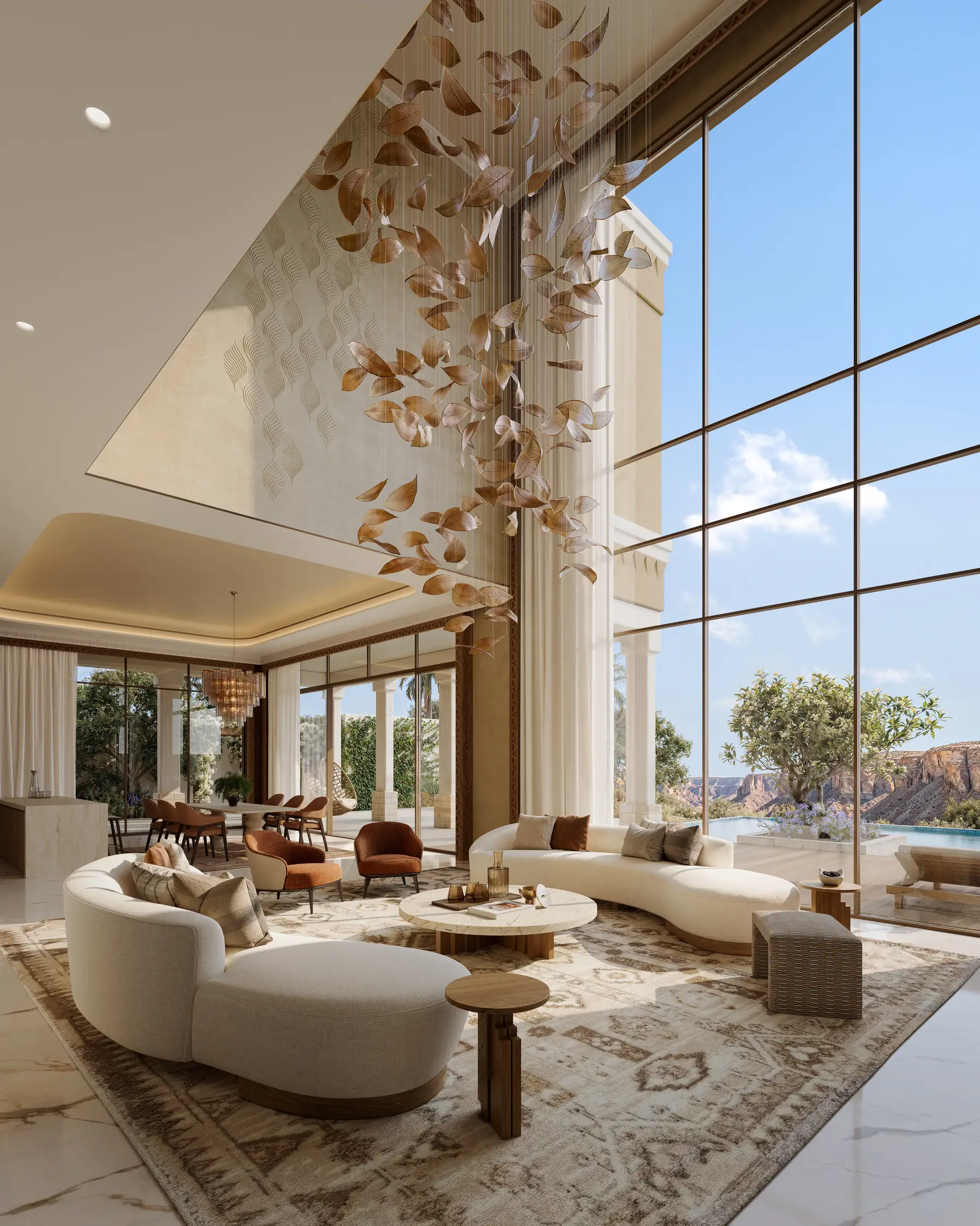 A double-height living room in a completed mansion, opening to the valley
