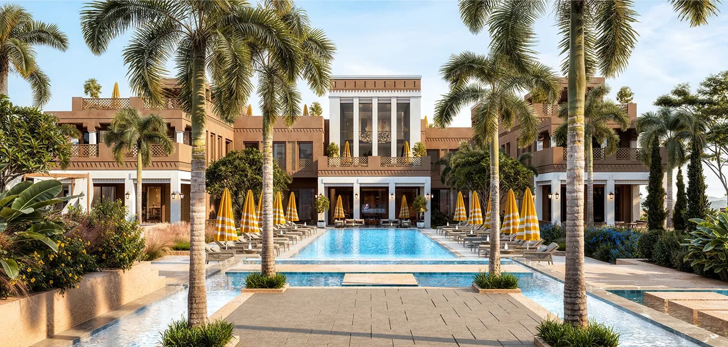 A pool terrace shaded by palms within the community