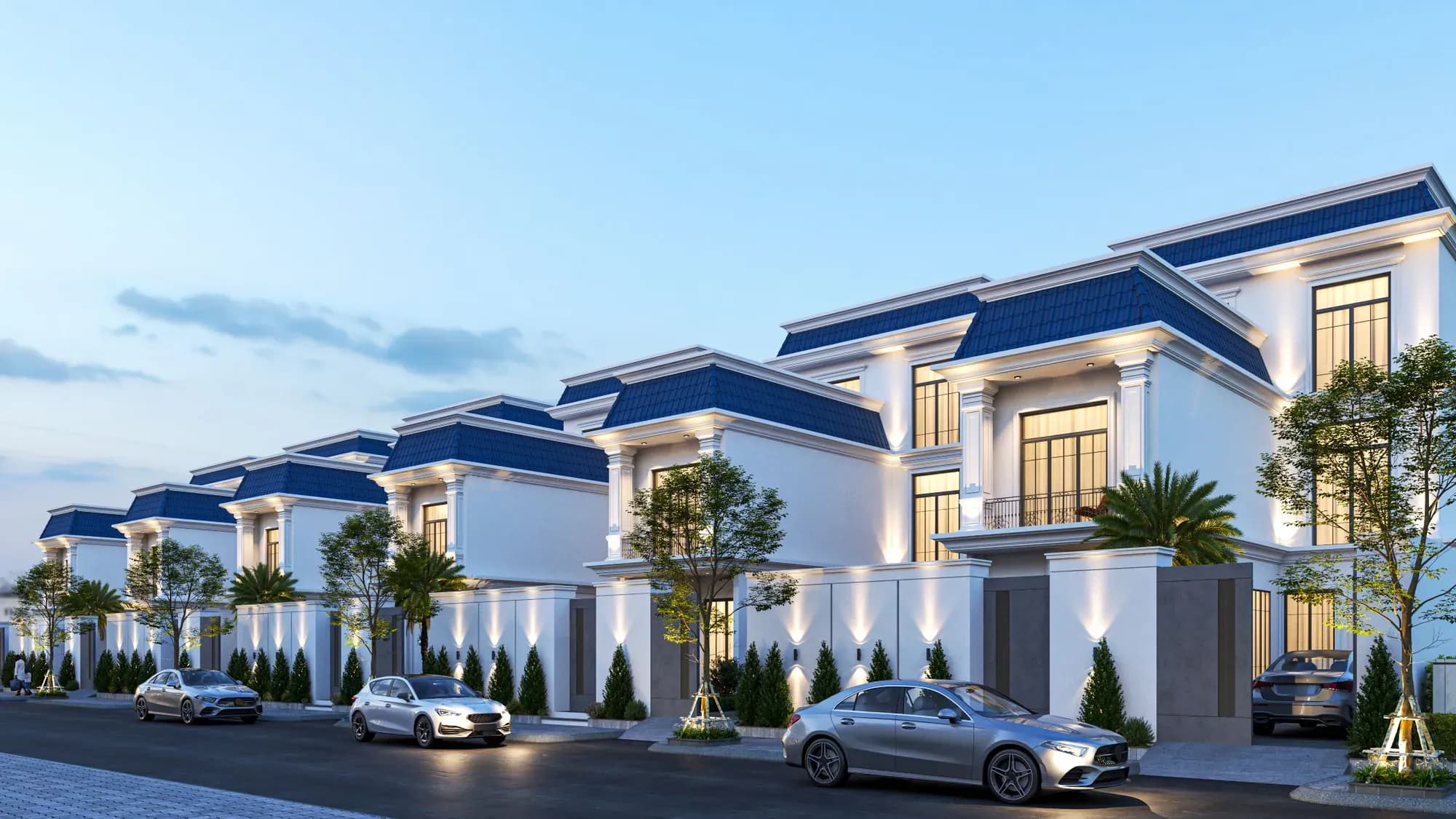 Developer render of a row of white villas with blue-grey roofs at Meshraf Al Majdiah, Madinah