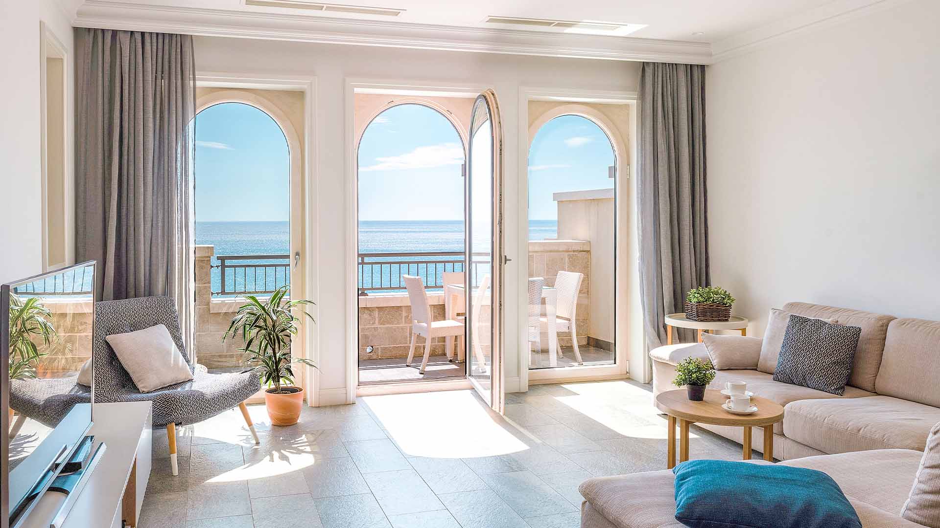 A living room opening to the sea