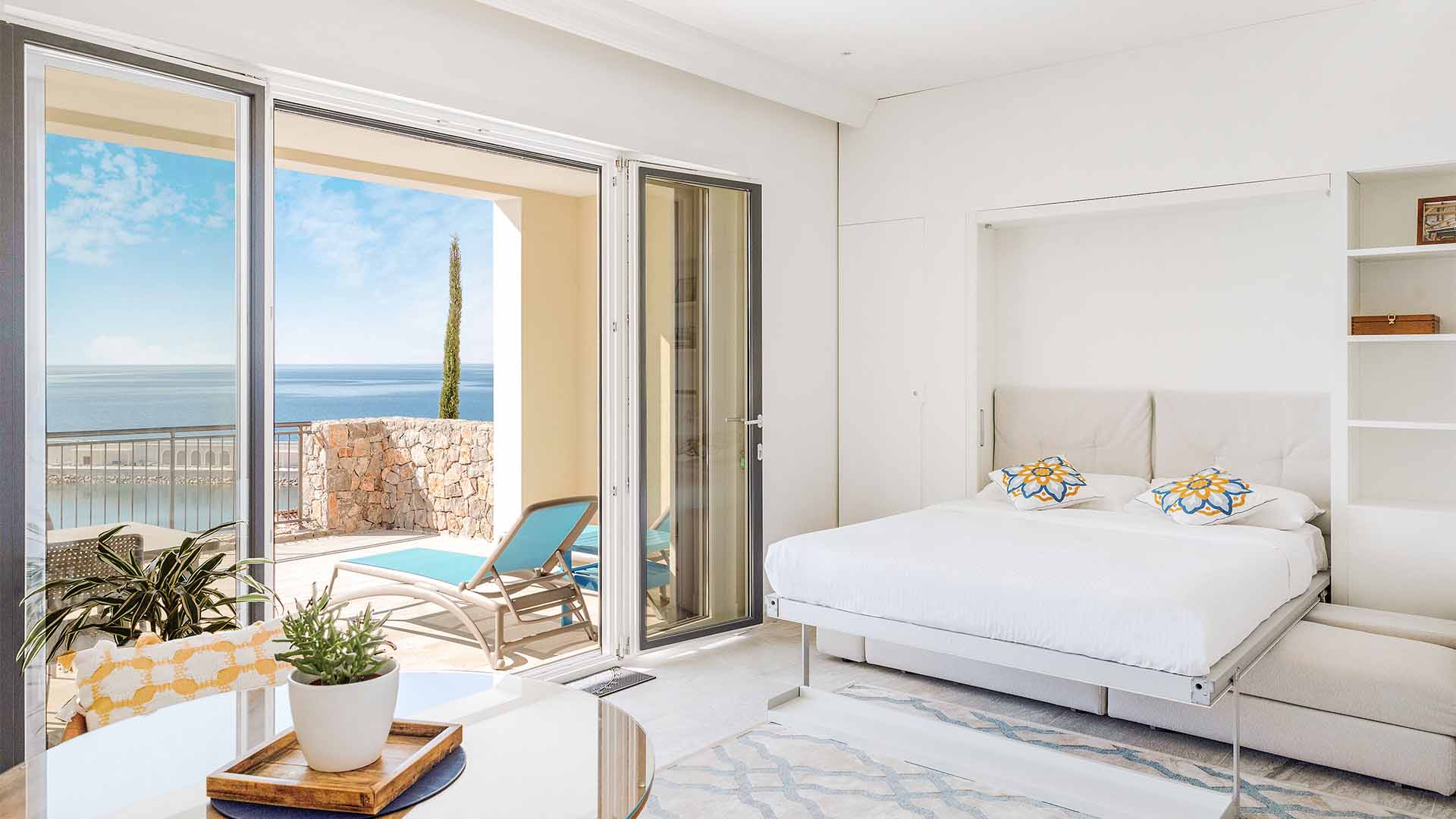 A bedroom facing the water