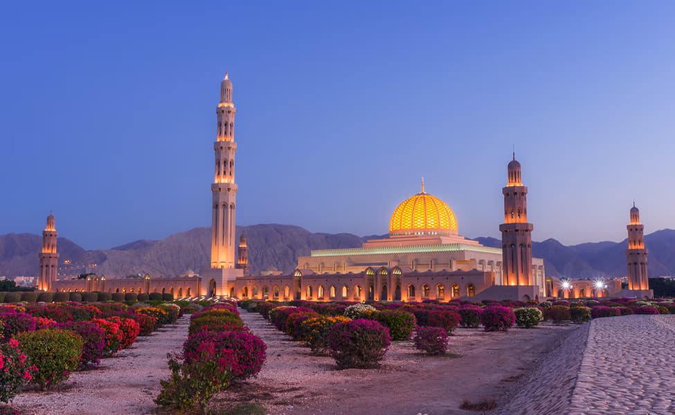 Muscat between the Hajar mountains and the Gulf of Oman, the capital threaded along its coastline