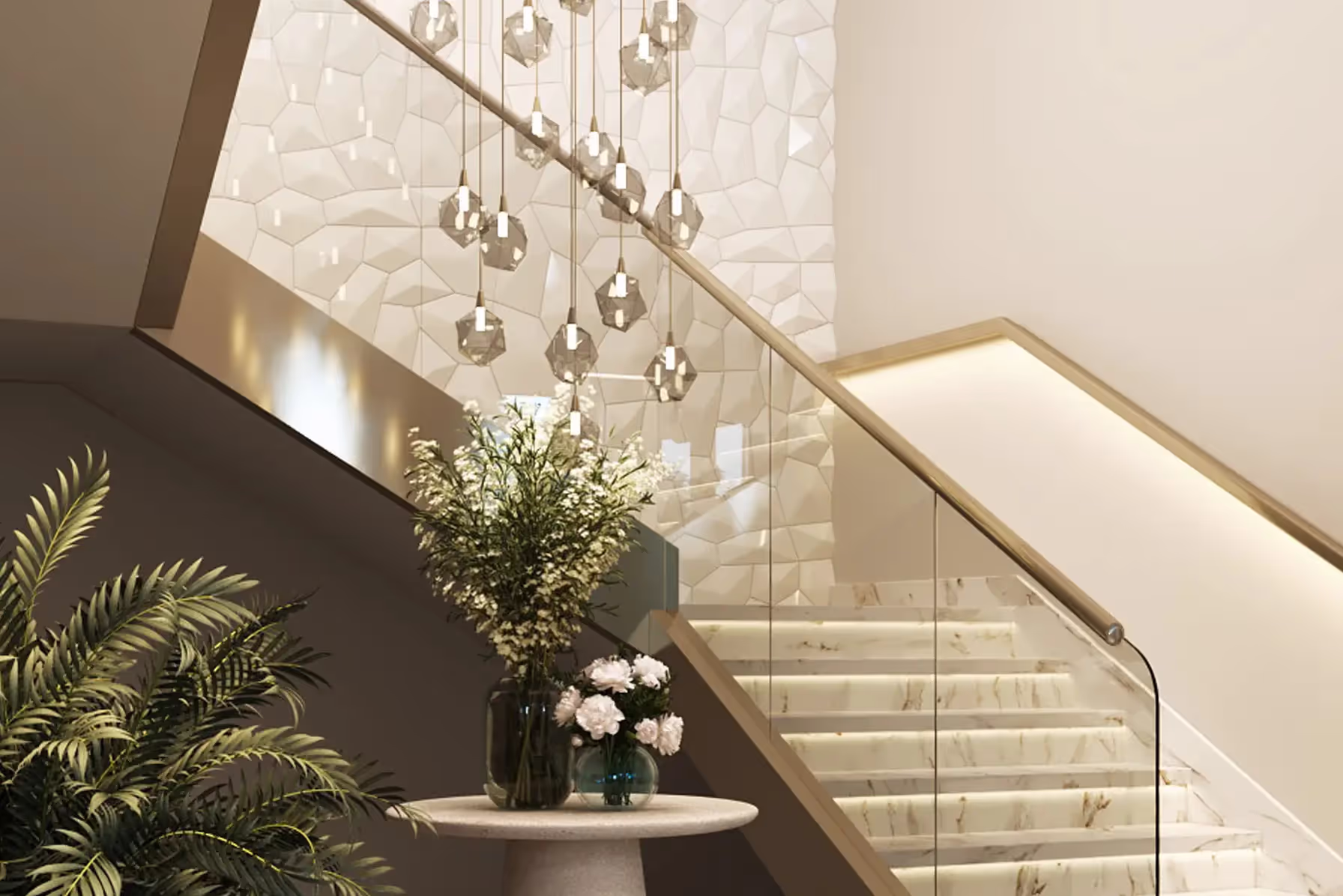 The staircase and its chandelier