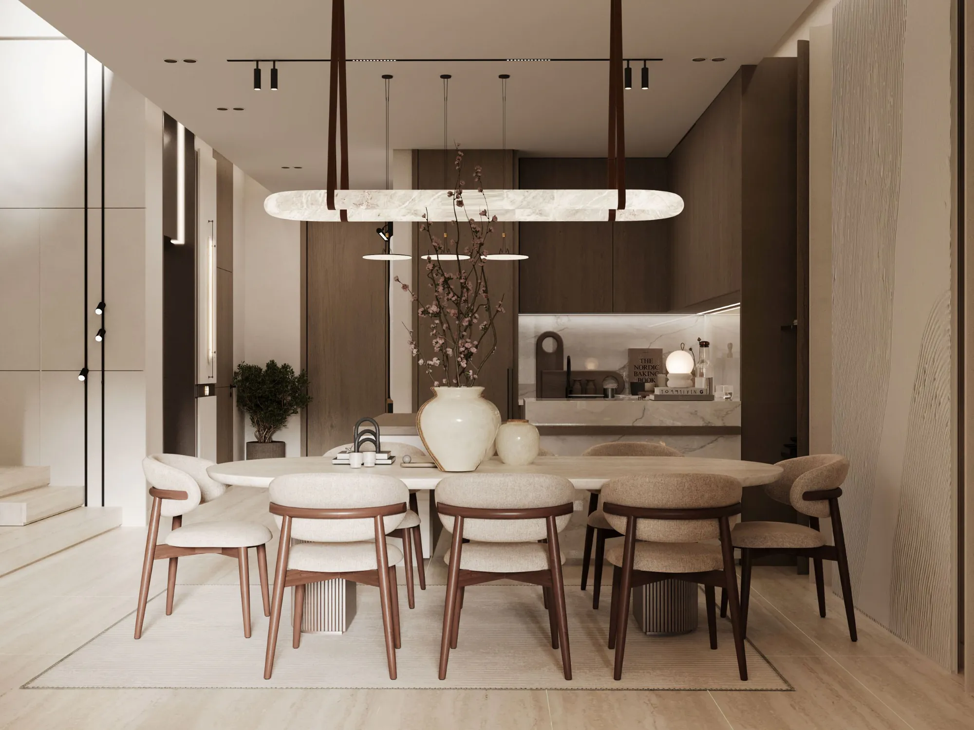 A dining area under a run of pendant lights.