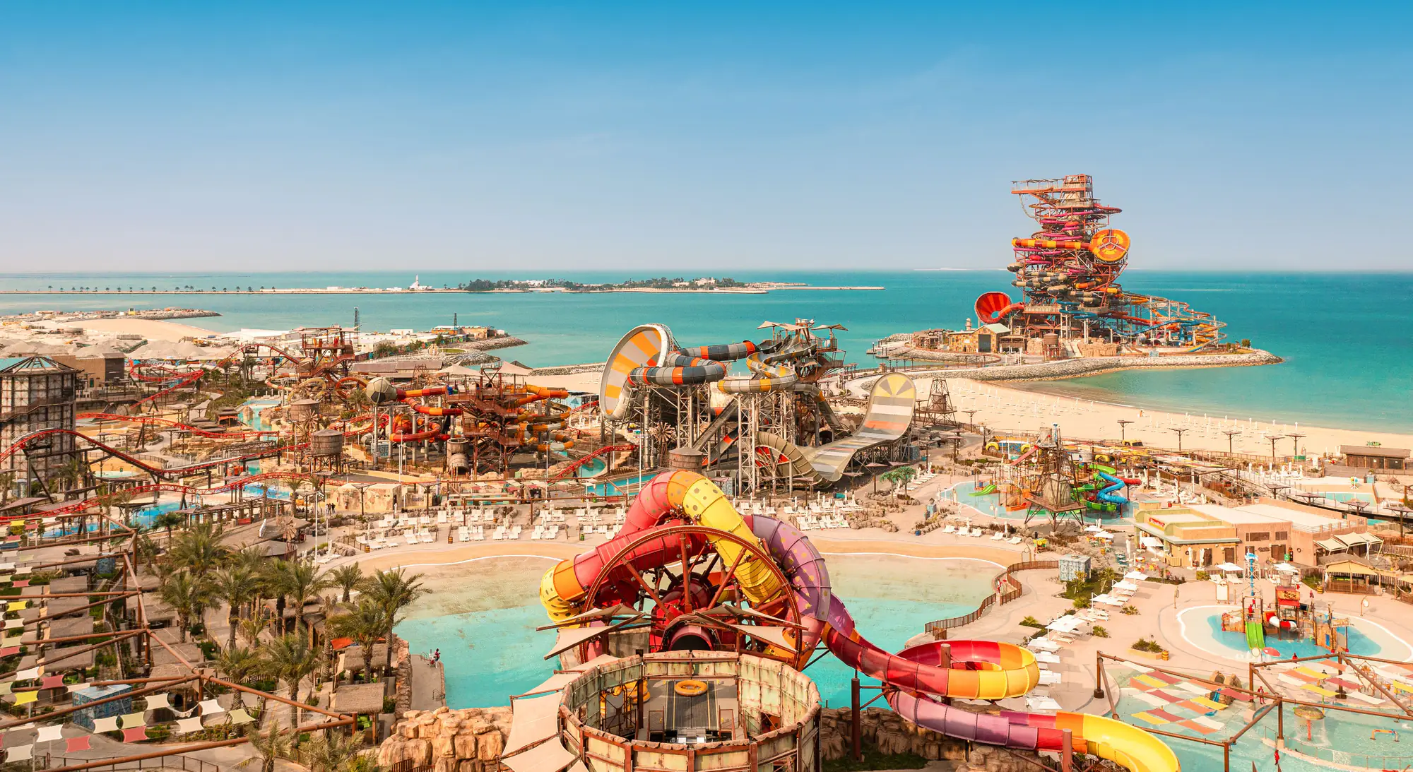 Meryal Waterpark on Qetaifan Island North, with its slide towers, lazy rivers and beach beside the Gulf